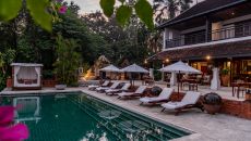 pool twilight at La Residence Phou Vao