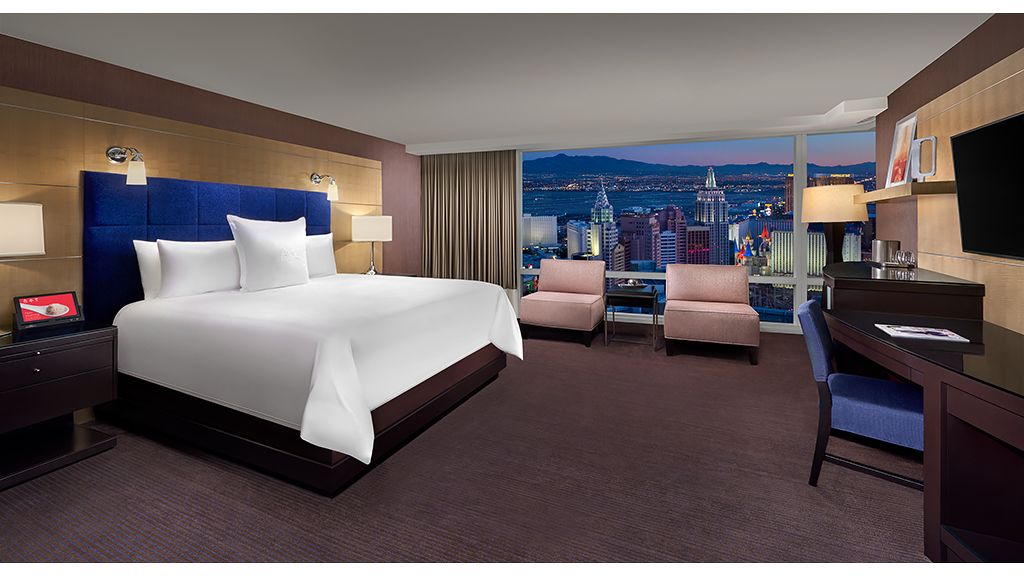 A standard king size bedroom at the Paris casino-hotel is seen on